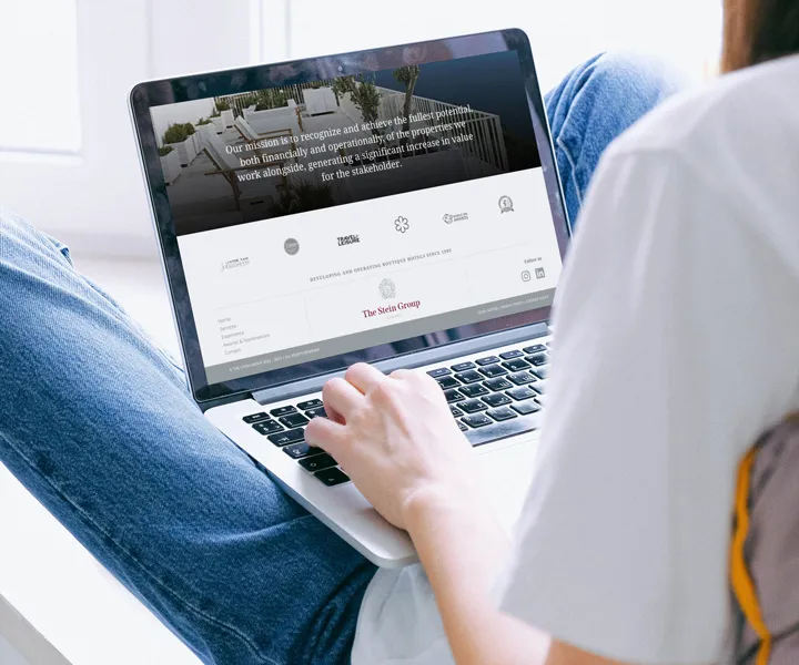 The stein group footer mission laptop mockup
