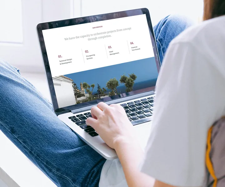 The stein group services page laptop mockup