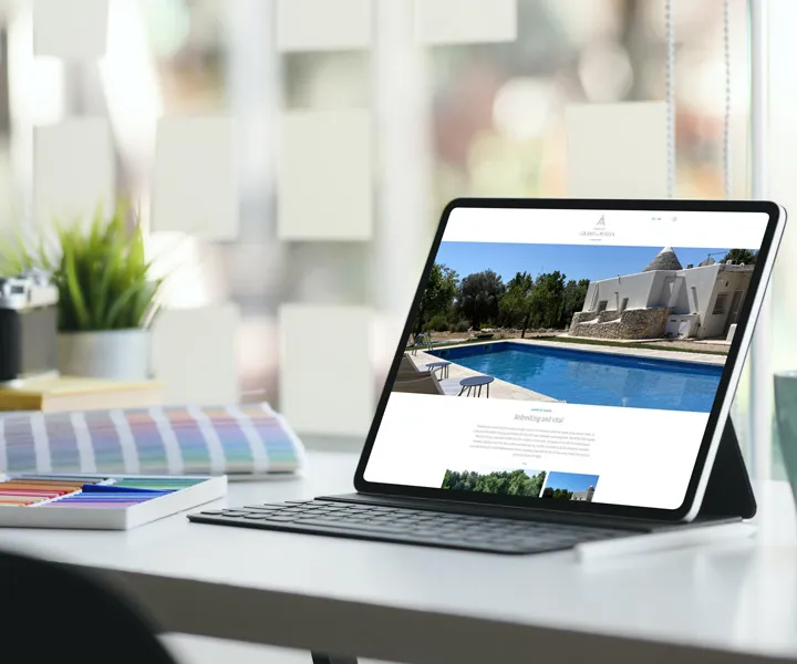 Trullo di puglia homepage ipad keyboard mockup
